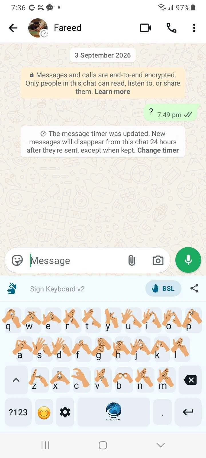 Sign Keyboard on Android showing hand-shape keys for each letter of the BSL alphabet inside a chat app
